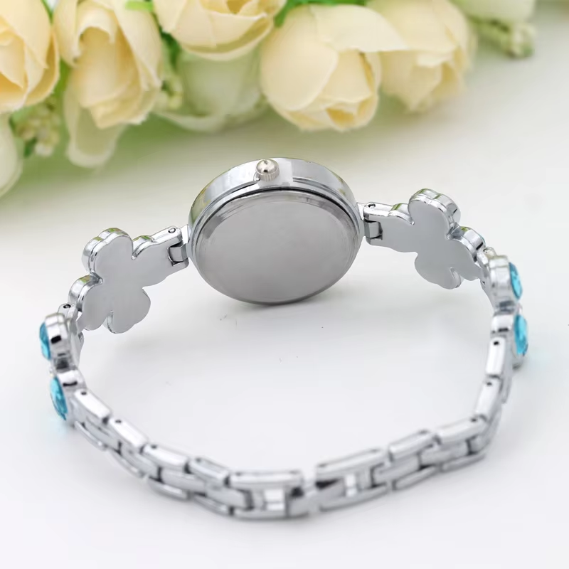 أربع أوراق البرسيم الإبداعية ش - مراجعة Jewels In Quartz Watches وسعره